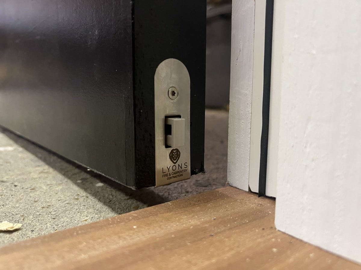 Intumescent protection detail on a fire door frame